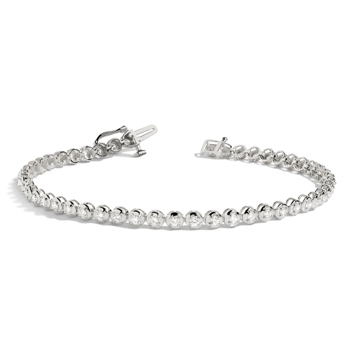 Mirfa bezel tennis bracelet in 18k white gold with rub-over set diamonds